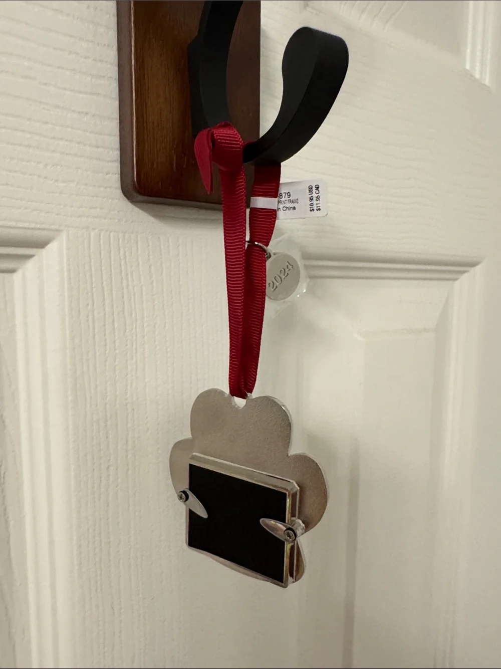 Crate&Barrel Silver Paw Ornament with Red Ribbon